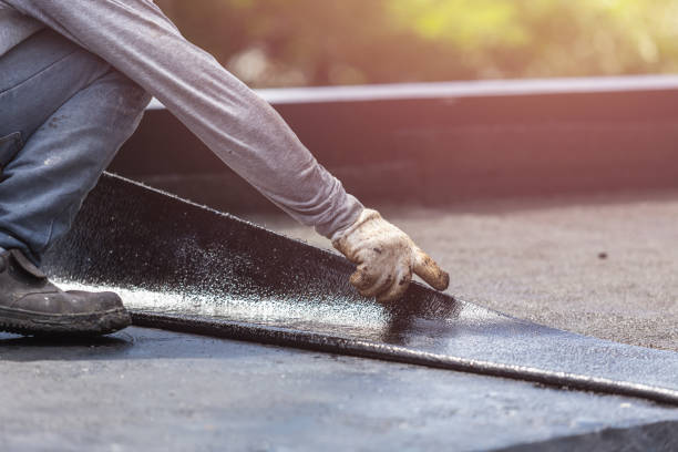 Professional Basement Waterproofing technician working in Kenton, TN